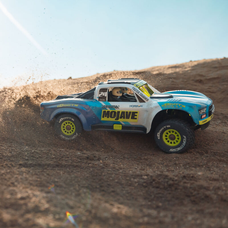 ARRMA MOJAVE GROM MEGA 380 Brushed 4X4 Small Scale Desert Truck RTR mit Akku & Lader, Blue/White ARA2104T2