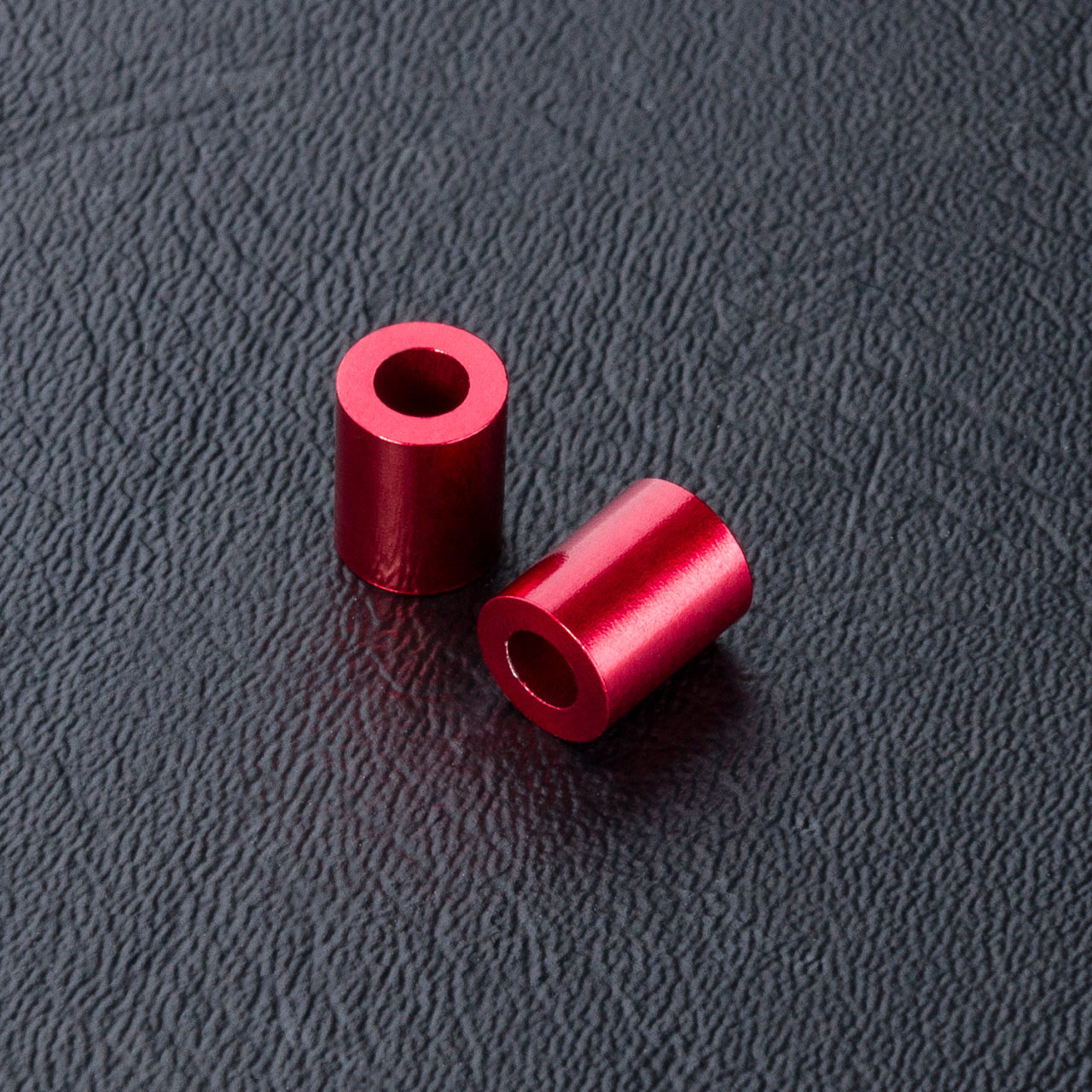 820077R Distanzbuchsen 3x5.5x7mm rot (2 Stück)